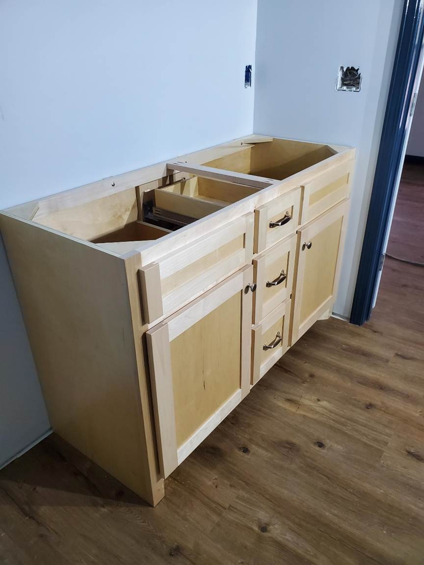 A picture containing cabinet, indoor, floor

Description automatically generated