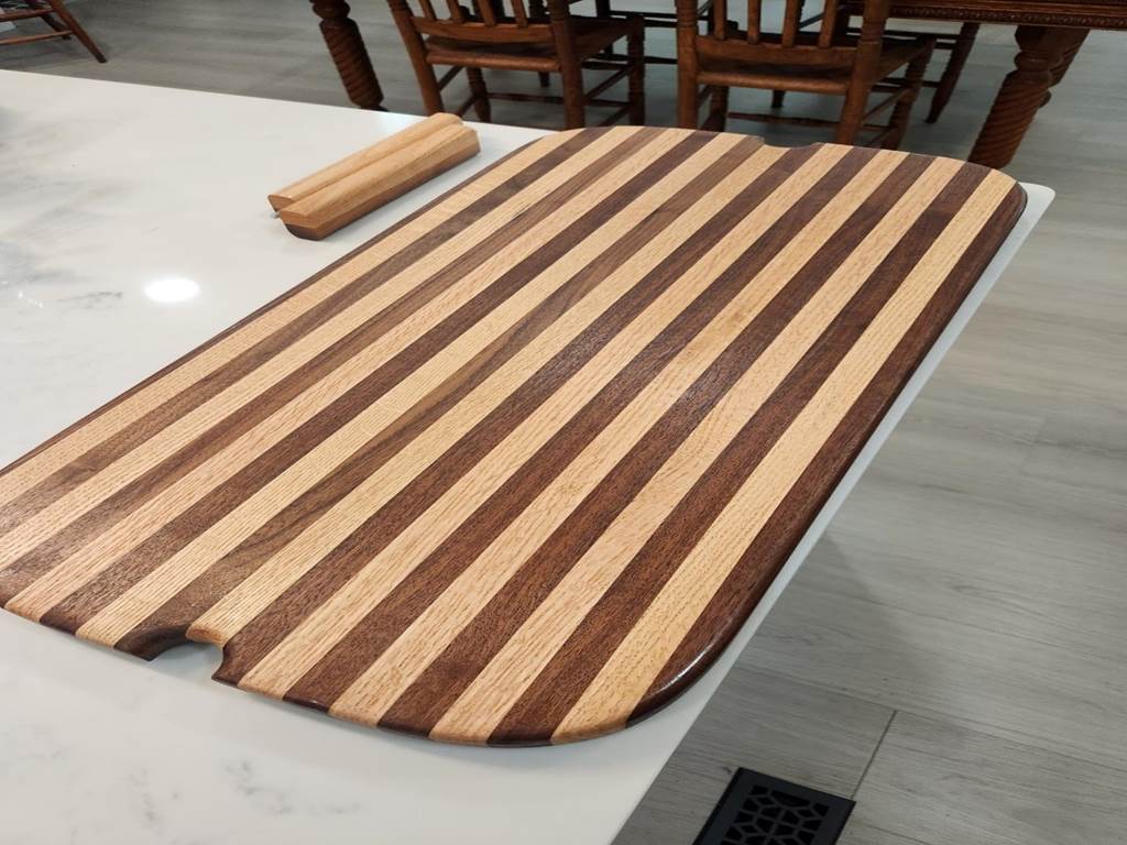 A wooden board on a table

Description automatically generated